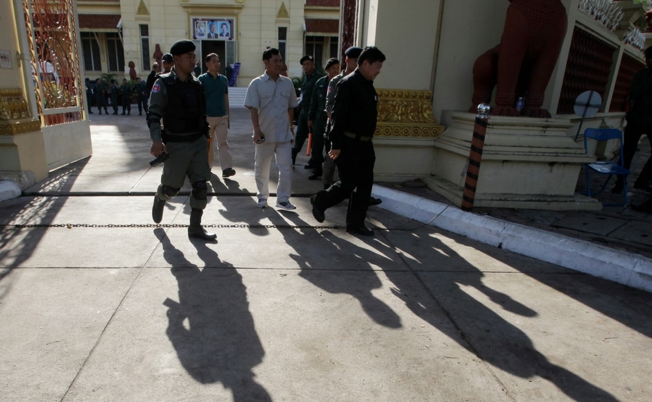 Chief Judge Dith Munty, who is a senior ruling party member, announced the nine-member court's unanimous ruling. He said 118 opposition party members would also be banned from politics for the next five years. AP Chief Judge Dith Munty, who is a senior ruling party member, announced the nine-member court's unanimous ruling. He said 118 opposition party members would also be banned from politics for the next five years. AP