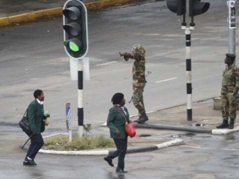 Zimbabwean high court says military action leading to Robert Mugabe's resignation was 'constitutional and lawful' Zimbabwean high court says military action leading to Robert Mugabe's resignation was 'constitutional and lawful'