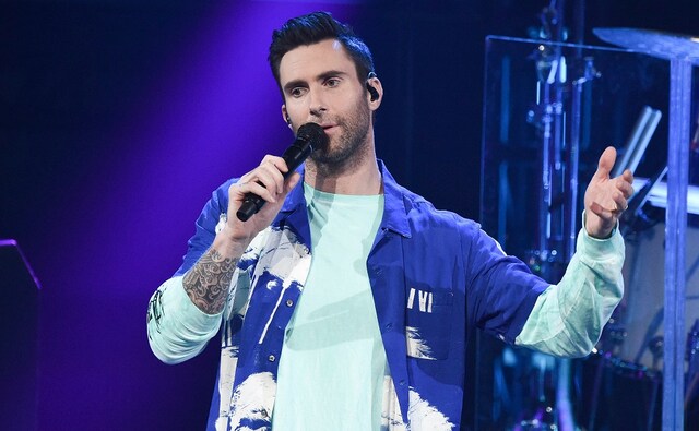 Adam Levine, frontman of Maroon 5 takes to the stage at the release of the band's new album. Image from AP/Richard Shotwell Adam Levine, frontman of Maroon 5 takes to the stage at the release of the band's new album. Image from AP/Richard Shotwell