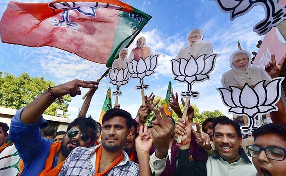 BJP supporters celebrate party's victories in Gujarat, Himachal Pradesh BJP supporters celebrate party's victories in Gujarat, Himachal Pradesh