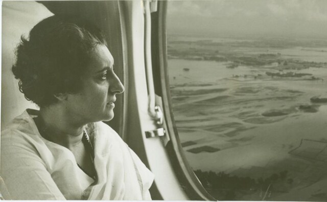 Indira Gandhi surveys the flood devastated areas from an airplane. IGMM Indira Gandhi surveys the flood devastated areas from an airplane. IGMM