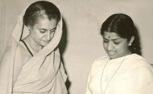 Indira Gandhi receiving an LP recording of Meerabai's bhajans recorded in the voice of Lata Mangeshkar. IGMM Indira Gandhi receiving an LP recording of Meerabai's bhajans recorded in the voice of Lata Mangeshkar. IGMM