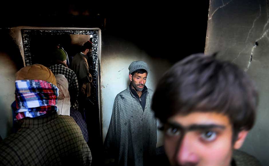 Even though the encounter concluded after the militants were killed, fighting continued between rock-throwing protesters and troops who fired bullets, shotgun pellets and tear gas. Kashmiri villagers look at the house which was damaged during a gun-battle at Shopian. AP Even though the encounter concluded after the militants were killed, fighting continued between rock-throwing protesters and troops who fired bullets, shotgun pellets and tear gas. Kashmiri villagers look at the house which was damaged during a gun-battle at Shopian. AP