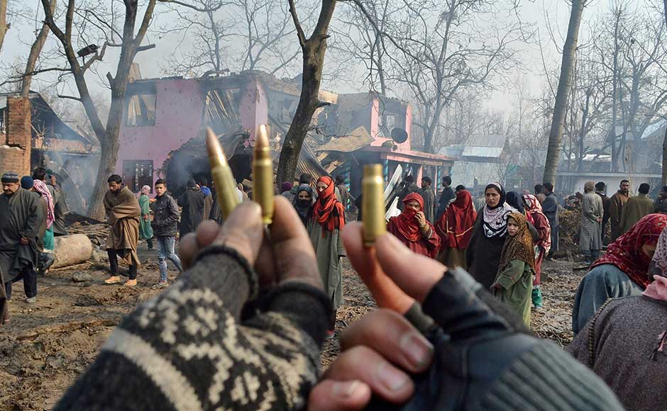 Over 200 militants, 75 police and soldiers and at least 40 civilians have died in Jammu and Kashmir this year, the deadliest since 2010. The surge in violence comes after massive anti-India protests and clashes erupted in Kashmir after militant leader Burhan Wani was killed over a year ago. People show bullets while inspecting the damaged homes after the encounter between security forces and militants. PTI Over 200 militants, 75 police and soldiers and at least 40 civilians have died in Jammu and Kashmir this year, the deadliest since 2010. The surge in violence comes after massive anti-India protests and clashes erupted in Kashmir after militant leader Burhan Wani was killed over a year ago. People show bullets while inspecting the damaged homes after the encounter between security forces and militants. PTI