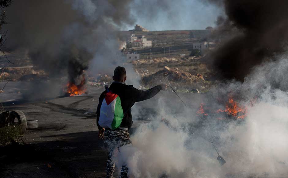 The Palestinians declared three "days of rage," shuttering schools and businesses and staging angry demonstrations at Damascus Gate, one of the entrances to Jerusalem's Old City, and cities across the West Bank and Gaza. AP The Palestinians declared three "days of rage," shuttering schools and businesses and staging angry demonstrations at Damascus Gate, one of the entrances to Jerusalem's Old City, and cities across the West Bank and Gaza. AP
