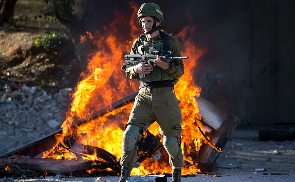 The Israeli military reported demonstrations in some 30 locations across the West Bank, saying Palestinians had hurled stones and firebombs at troops. A military official said troops were instructed to use minimal force and avoid live fire to avoid escalating tensions. AP The Israeli military reported demonstrations in some 30 locations across the West Bank, saying Palestinians had hurled stones and firebombs at troops. A military official said troops were instructed to use minimal force and avoid live fire to avoid escalating tensions. AP