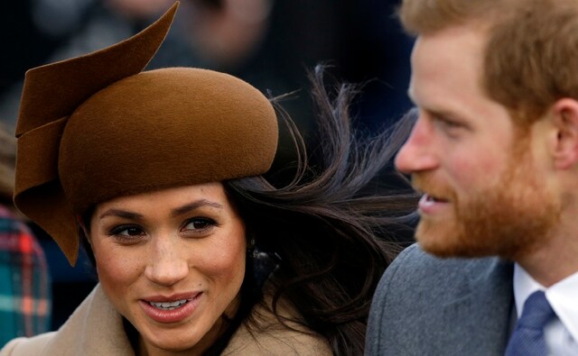 Prince Harry and his fiancee Meghan Markle arrive to attend the traditional Christmas Day service. AP/Alastair Grant Prince Harry and his fiancee Meghan Markle arrive to attend the traditional Christmas Day service. AP/Alastair Grant