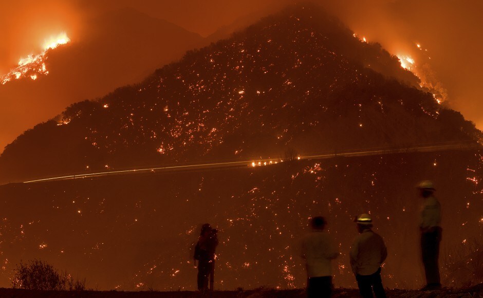 Three people were burned trying to escape a fast-moving fire that started Thursday 50 miles (80 kilometers) north of San Diego that overran a mobile home retirement community and a race horse training facility. AP Three people were burned trying to escape a fast-moving fire that started Thursday 50 miles (80 kilometers) north of San Diego that overran a mobile home retirement community and a race horse training facility. AP