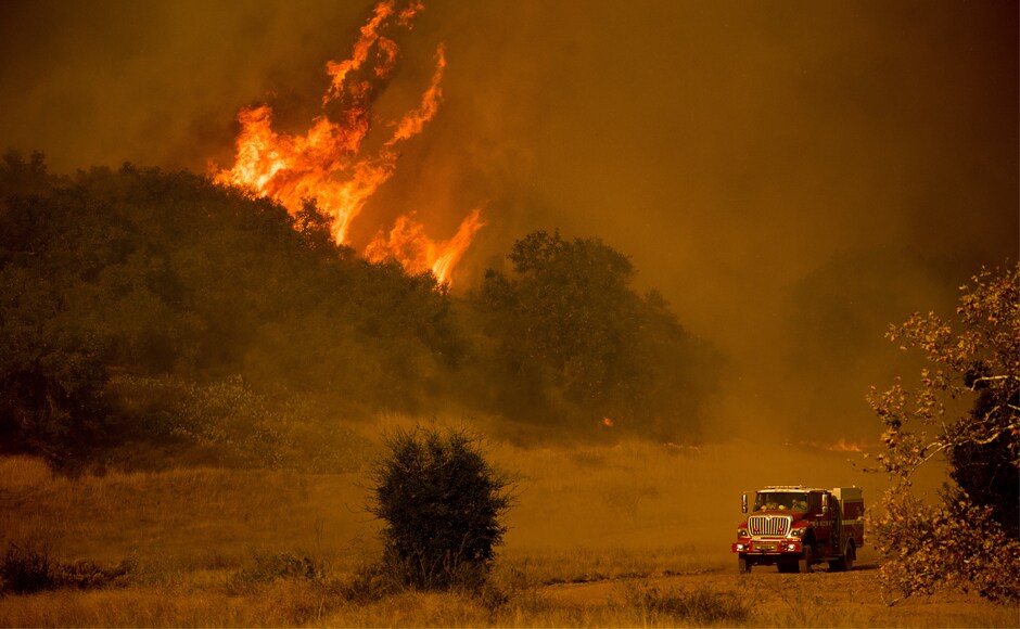 With gusts of up to 60 miles per hour (95 kilometers per hour), relentless seasonal winds had continued to stoke the fires on Friday, spitting embers and creating "extreme fire danger". AP With gusts of up to 60 miles per hour (95 kilometers per hour), relentless seasonal winds had continued to stoke the fires on Friday, spitting embers and creating "extreme fire danger". AP