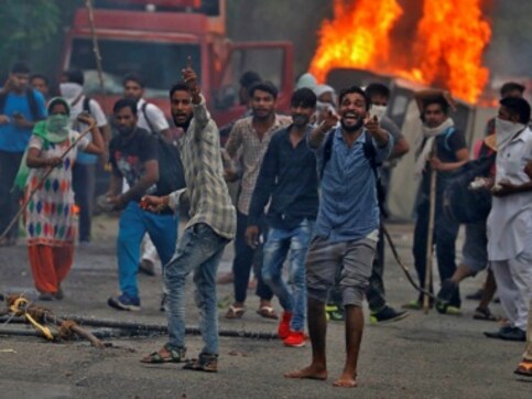 Four Dera Sacha Sauda followers arrested for torching rail coaches at Anand Vihar station yard Four Dera Sacha Sauda followers arrested for torching rail coaches at Anand Vihar station yard