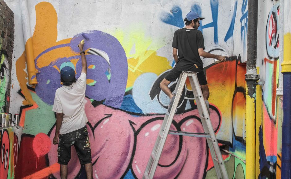 Artists Do & Khatra at the Sassoon Dock Art Project. St+art India Foundation/Pranav Gohil Mumbai's 142-year-old Sassoon Docks gets a street art makeover courtesy St+Art India