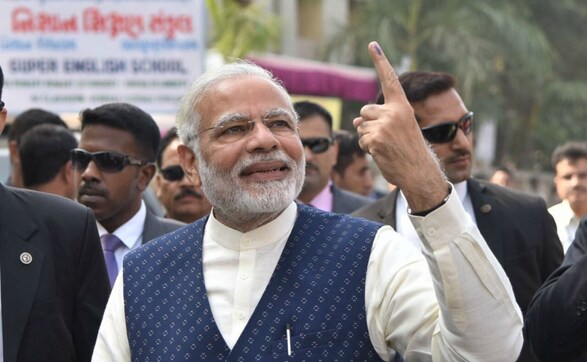Gujarat Assembly election: Narendra Modi waits in queue, casts vote in Sabarmati constituency Gujarat Assembly election: Narendra Modi waits in queue, casts vote in Sabarmati constituency