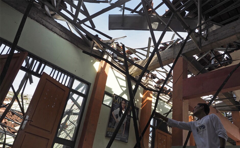 At least three people have been killed following a strong 6.5-magnitude earthquake on Indonesia's main island of Java on Friday. AP At least three people have been killed following a strong 6.5-magnitude earthquake on Indonesia's main island of Java on Friday. AP