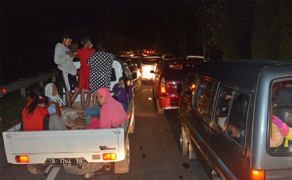 Vehicles stuck in traffic as people try to reach higher ground amid fears of a tsunami due to the earthquake. AP Vehicles stuck in traffic as people try to reach higher ground amid fears of a tsunami due to the earthquake. AP