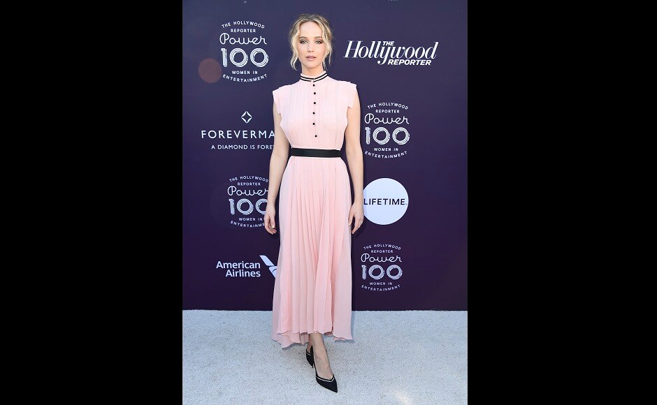 Jennifer Lawrence arrives at The Hollywood Reporter's Women in Entertainment Breakfast at Milk Studios in Los Angeles. AP Jennifer Lawrence arrives at The Hollywood Reporter's Women in Entertainment Breakfast at Milk Studios in Los Angeles. AP