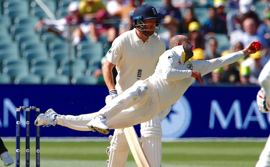 England's Jonny Bairstow watches as Australia's Nathan Lyon dives to take a catch to dismiss England's Moeen Ali. Reuters England finally fire on Day 3 but Australia still in charge of Ashes 2nd Test