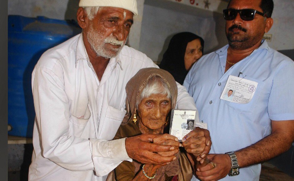 126-year-old Ajiben arrived at a poll booth to cast her vote in the first phase of Gujarat Assembly election in Rajkot on Saturday. PTI Gujarat election: People from all walks of life come out to vote in the first phase