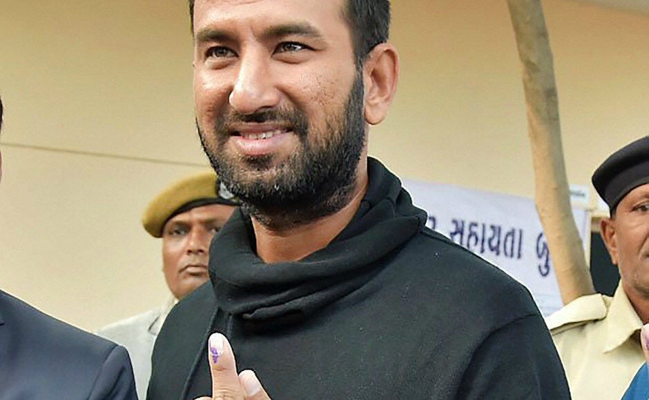 Indian cricketer Cheteshwar Pujara casted his vote in the first phase of Gujarat elections. He asked youngsters to exercise their franchise. PTI Gujarat election: People from all walks of life come out to vote in the first phase