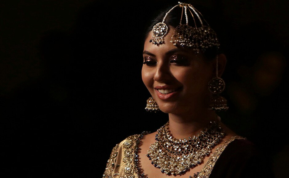 A model presents a creation by designer Uzma Babar during the Pantene Hum Bridal Couture Week in Lahore, Pakistan. AP Photo A model presents a creation by designer Uzma Babar during the Pantene Hum Bridal Couture Week in Lahore, Pakistan. AP Photo