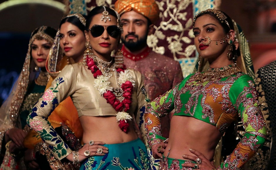 Models present creations by designer Ali Xeeshan during the Pantene Hum Bridal Couture Week in Lahore, Pakistan. AP Photo Models present creations by designer Ali Xeeshan during the Pantene Hum Bridal Couture Week in Lahore, Pakistan. AP Photo