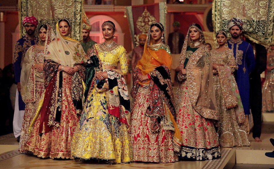 Models present creations by designer Ali Xeeshan during the Pantene Hum Bridal Couture Week in Lahore, Pakistan. AP Photo Models present creations by designer Ali Xeeshan during the Pantene Hum Bridal Couture Week in Lahore, Pakistan. AP Photo