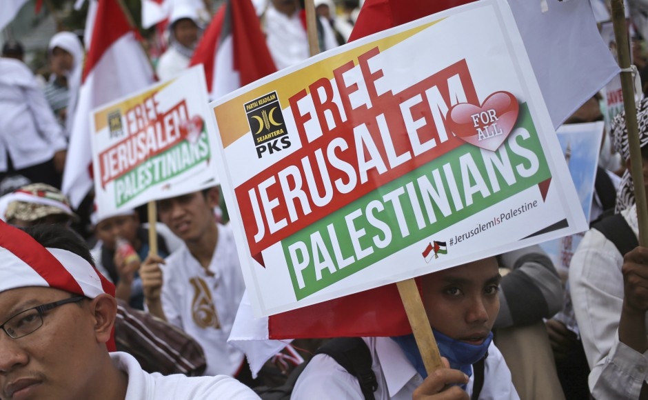 Thousands protested outside the US Embassy in the Indonesian capital on Sunday against President Donald Trump’s decision to recognize Jerusalem as Israel’s capital, many waving banners saying “Palestine is in our hearts”. AP Thousands in Indonesia protest Donald Trump's move to recognise Jerusalem as Israel's capital