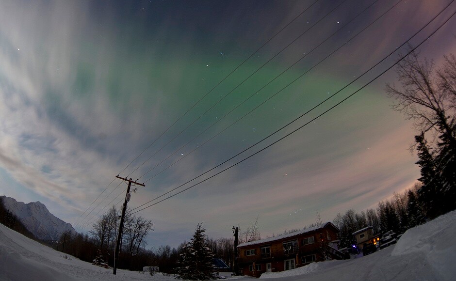 The Aurora Borealis is pictured above a house along the Old Glenn Highway, Alaska. REUTERS The Aurora Borealis is pictured above a house along the Old Glenn Highway, Alaska. REUTERS