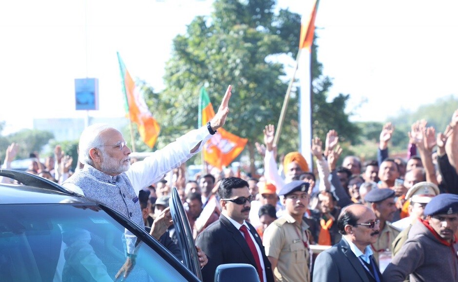 Modi was given a grand welcome in Gujarat upon his arrival. Newly-elected Chief Minister of Gujarat Vijay Rupani and his cabinet will take oath at Helipad Ground inside New Secretariat complex in Gandhinagar. Twitter @BJP4Gujarat Narendra Modi in Gujarat to attend Vijay Rupani's oath-taking ceremony, receives grand welcome