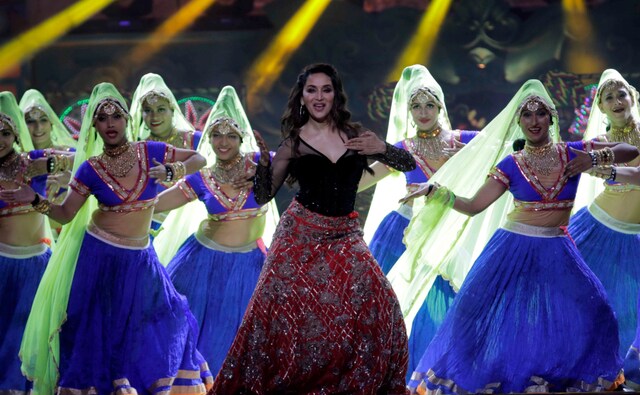 Madhuri Dixit was grace, class and elegance personified as per usual as she made everyone fall in love with her moves. Image from Firstpost/Sachin Gokhale Madhuri Dixit was grace, class and elegance personified as per usual as she made everyone fall in love with her moves. Image from Firstpost/Sachin Gokhale