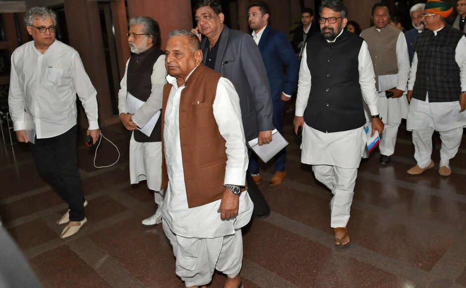 The House adjourned for 20 minutes till noon and again till 2.30 pm, after which it reassembled, with members of the Congress and Samajwadi Party storming the well and raising slogans opposing the disqualification of Yadav and Ali Anwar Ansari. PTI The House adjourned for 20 minutes till noon and again till 2.30 pm, after which it reassembled, with members of the Congress and Samajwadi Party storming the well and raising slogans opposing the disqualification of Yadav and Ali Anwar Ansari. PTI