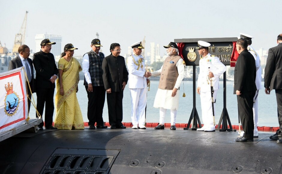 Navy chief Admiral Sunil Lanba, National Security Adviser Ajit Doval, Defence Minister Nirmala Sitharaman and French Ambassador to India Alexandre Ziegler were among those present at the ceremony. PTI Narendra Modi commissions Scorpene-class submarine INS Kalvari in Mumbai