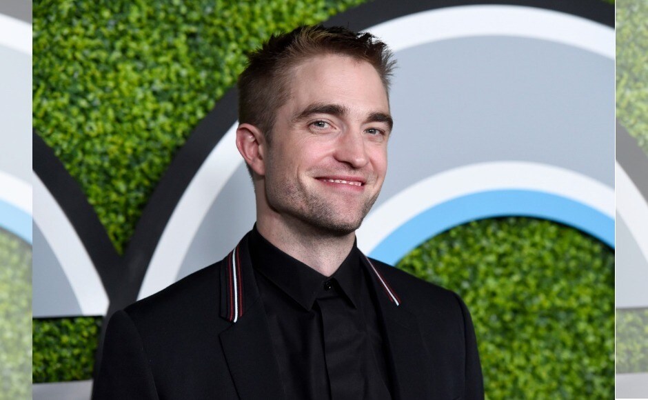 Robert Pattinson was also spotted at the event in a bespoke suit. Image from AP/Chris Pizzello Robert Pattinson was also spotted at the event in a bespoke suit. Image from AP/Chris Pizzello