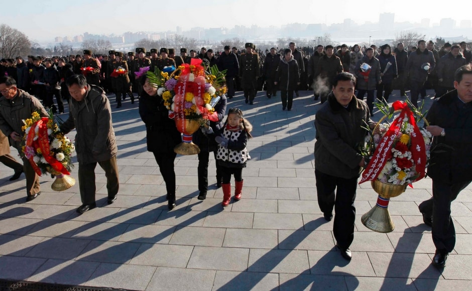Senior ruling party officials visited a mausoleum on the outskirts of the city where the elder Kims lie in state at midnight. AP Senior ruling party officials visited a mausoleum on the outskirts of the city where the elder Kims lie in state at midnight. AP
