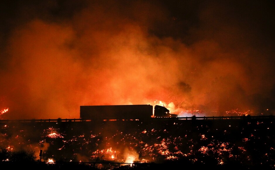 As of Friday, 18,000 homes and other buildings were technically still at risk, there was little flame showing in previously burned areas and the fire was moving slowly through remote wilderness. AP California wildfire becomes biggest in state's history; 2 killed in over 2 weeks, 18,000 homes at risk