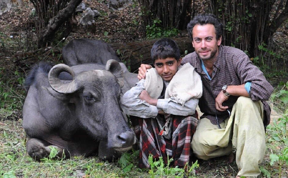 A community that lives off the land, an annual migration of around 200 kilometres to the middle Himalayas and an everlasting bond with buffaloes that would put a dog’s love to shame was enough of a draw for American photojournalist Michael Benanav to make his way to India in order to spend some time with the Van Gujjars. Here, Benanav poses with Sharafat (16). A community that lives off the land, an annual migration of around 200 kilometres to the middle Himalayas and an everlasting bond with buffaloes that would put a dog’s love to shame was enough of a draw for American photojournalist Michael Benanav to make his way to India in order to spend some time with the Van Gujjars. Here, Benanav poses with Sharafat (16).