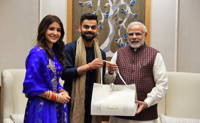 She wore a royal blue sequined suit during her meeting with the Prime Minister. She wore a royal blue sequined suit during her meeting with the Prime Minister.