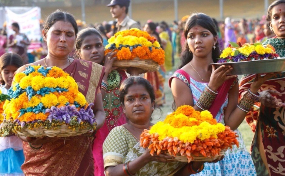 Made by the women of the house on a brass plate, flowers of different colors are arranged on top of each other in a conical arrangement, gradually decreasing in size. Atop the mound is a small cone of turmeric representing the Goddess Gowri. Photo courtesy Myasa Balu Made by the women of the house on a brass plate, flowers of different colors are arranged on top of each other in a conical arrangement, gradually decreasing in size. Atop the mound is a small cone of turmeric representing the Goddess Gowri. Photo courtesy Myasa Balu
