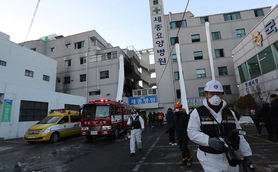 Around 130 others were hurt in the fire, which comes just weeks before thousands of athletes and foreign visitors are expected in the country for the Winter Olympics. Police investigators leave after inspecting a hospital after a fire in Miryang, South Korea. AP Around 130 others were hurt in the fire, which comes just weeks before thousands of athletes and foreign visitors are expected in the country for the Winter Olympics. Police investigators leave after inspecting a hospital after a fire in Miryang, South Korea. AP
