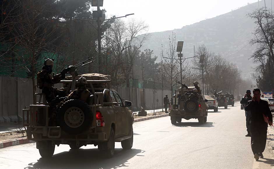 The explosion comes exactly a week after Taliban militants stormed a luxury hotel in Kabul, killing at least 22 people, a majority of them foreigners. Security forces are driven to the site of a deadly suicide attack in the centre of Kabul. AP 63 killed, 151 injured after Taliban explodes ambulance packed with explosives in Kabul
