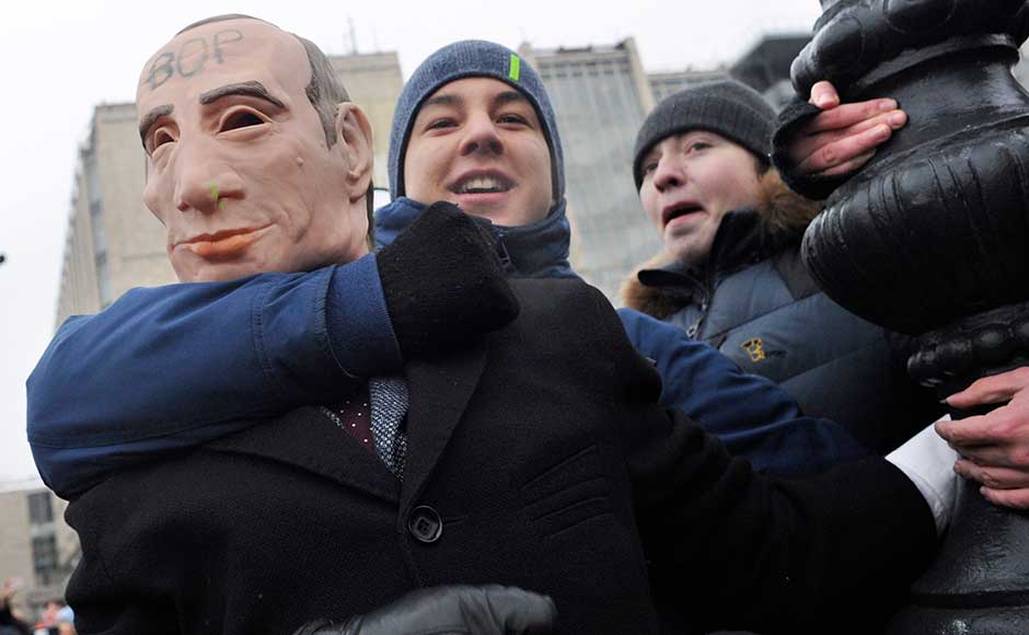 Several hundred demonstrators assembled on the centre square of the Pacific port city of Vladivostok, complaining both of President Vladimir Putin, who is running for a fourth term, and of the exclusion of Navalny. AP Several hundred demonstrators assembled on the centre square of the Pacific port city of Vladivostok, complaining both of President Vladimir Putin, who is running for a fourth term, and of the exclusion of Navalny. AP