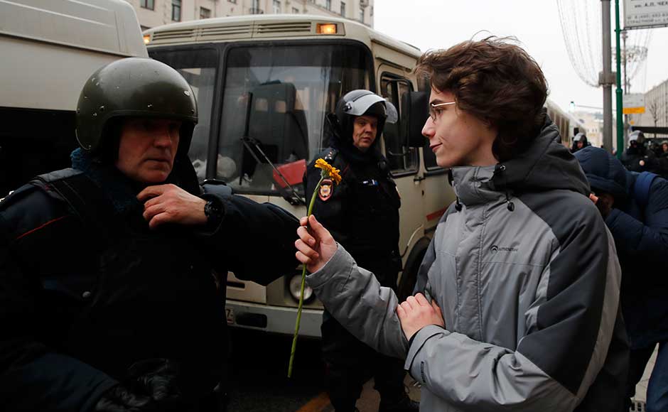 Last year, he called for two demonstrations which attracted people throughout the country, undermining critics' claims that he appeals only to a narrow segment of prosperous urbanites. A protester offers a flower to a policeman during a rally in Moscow. AP Last year, he called for two demonstrations which attracted people throughout the country, undermining critics' claims that he appeals only to a narrow segment of prosperous urbanites. A protester offers a flower to a policeman during a rally in Moscow. AP