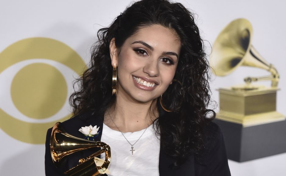 Alessia Cara poses in the press room with the best new artist award. She remembered the time when she would "win" Grammys in her dreams while singing in the shower. AP Alessia Cara poses in the press room with the best new artist award. She remembered the time when she would "win" Grammys in her dreams while singing in the shower. AP