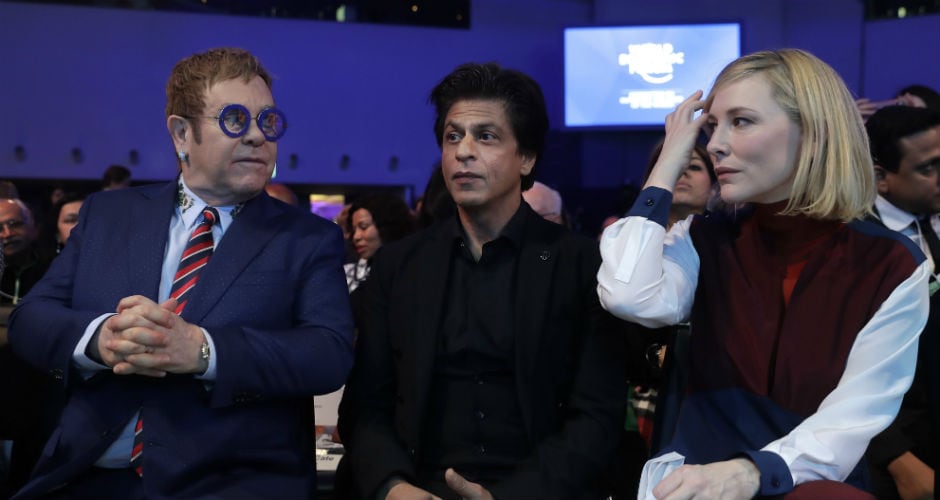 On Monday, Bollywood actor Shah Rukh Khan along with Hollywood actress Cate Blanchett and musician Elton John received the Crystal award on the sidelines of the annual economic summit. AP On Monday, Bollywood actor Shah Rukh Khan along with Hollywood actress Cate Blanchett and musician Elton John received the Crystal award on the sidelines of the annual economic summit. AP