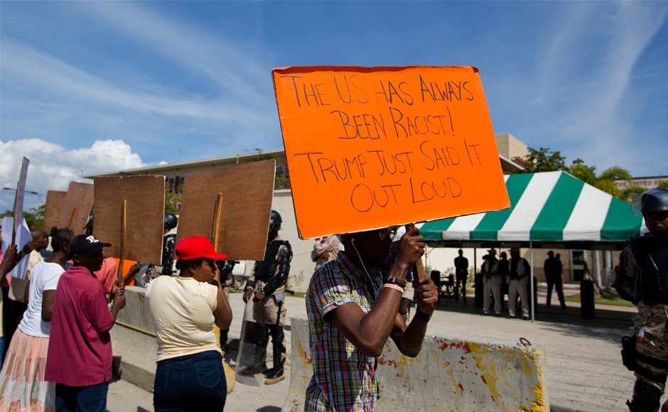 The reported comments ignited a firestorm of global condemnation and accusations — including from Haiti's government and on Thursday from the country's Senate — that he is racist. AP Dozens protest against Donald Trump's 'shithole' remark outside US embassy in Haiti