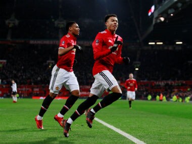 Manchester United's Jesse Lingard and Anthony Martial celebrate team's opening goal. Reuters