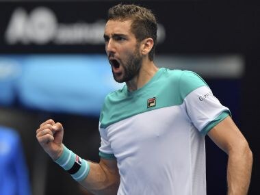 Marin Cilic celebrates after defeating Pablo Carreno Busta in their fourth round match. AP