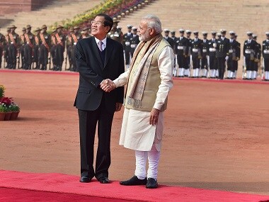 Prime Minister Narendra Modi with his Cambodian counterpart Hun Sen. PTI