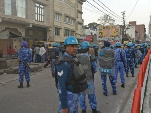 Kasganj violence: Police probe unverified video showing men carrying guns as UP town limps back to normalcy Kasganj violence: Police probe unverified video showing men carrying guns as UP town limps back to normalcy