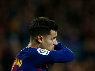 FC Barcelona's Philippe Coutinho gestures during the Spanish Copa del Rey, quarter final, second leg, soccer match between FC Barcelona and Espanyol at the Camp Nou stadium in Barcelona, Spain, Thursday, Jan. 25, 2018. (AP Photo/Manu Fernandez)