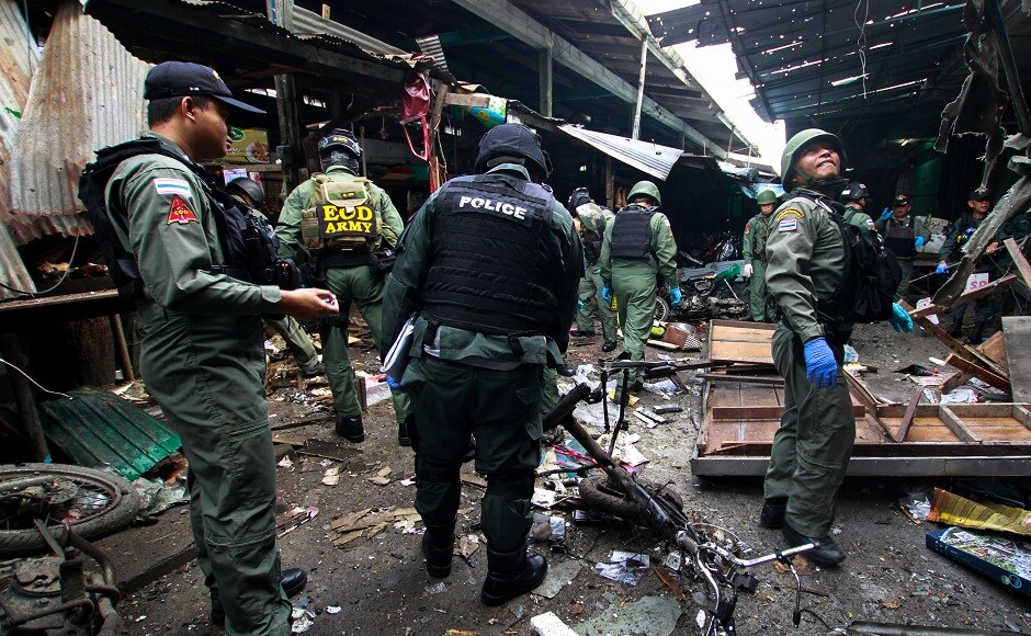 Police said the motorcycle was placed near a stall selling pork. The wounded were taken to the main hospital in Yala. Reuters Police said the motorcycle was placed near a stall selling pork. The wounded were taken to the main hospital in Yala. Reuters